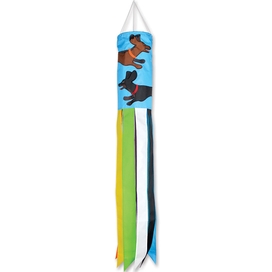 Colorful Dachshund windsock displayed outdoors, fluttering in the breeze, showcasing the charming design of the breed.