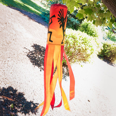 Dancing Kokopelli windsock featuring intricate graphics and vibrant colors, gracefully fluttering with the wind and enhancing any outdoor decor.