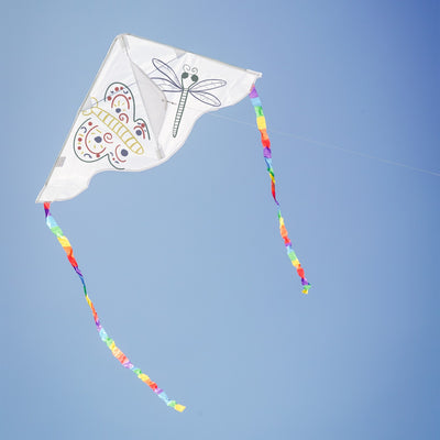 Visualize the Delta Coloring Kite: a 30-inch blank kite ready for artistic expression, showcasing its round edges and colorful rainbow stripe tails against a bright sky.