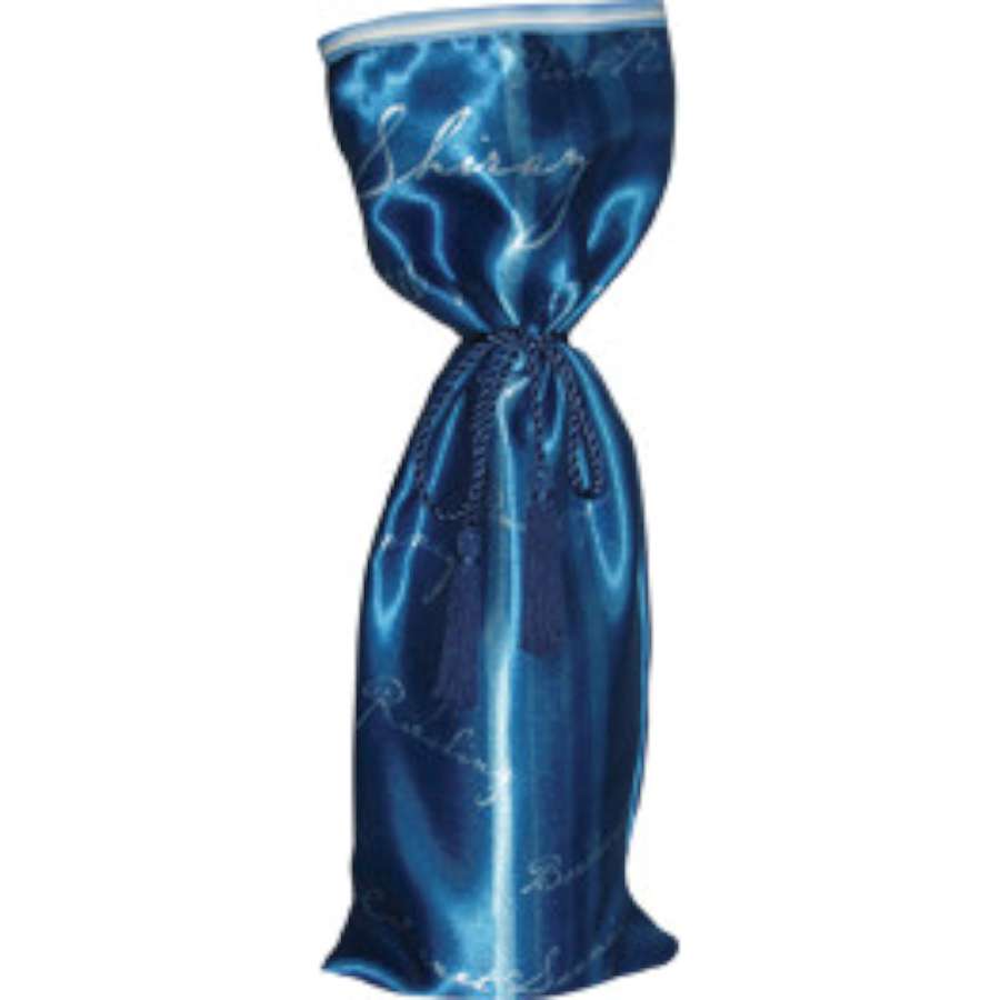 Deluxe Happy Hour gift bag made of luxurious satin fabric, featuring tassels and trim, elegantly presented on a decorative setting.