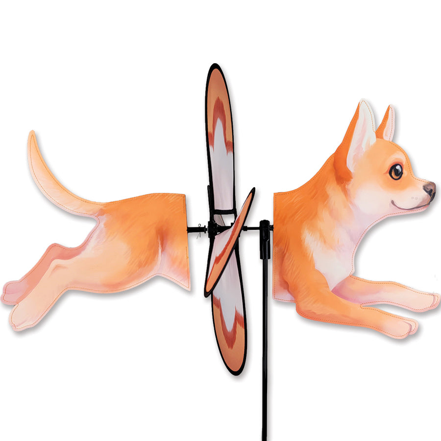 Deluxe Petite Spinner - Chihuahua with vibrant colors and playful design spins in the wind, adding charm to an outdoor garden setting.