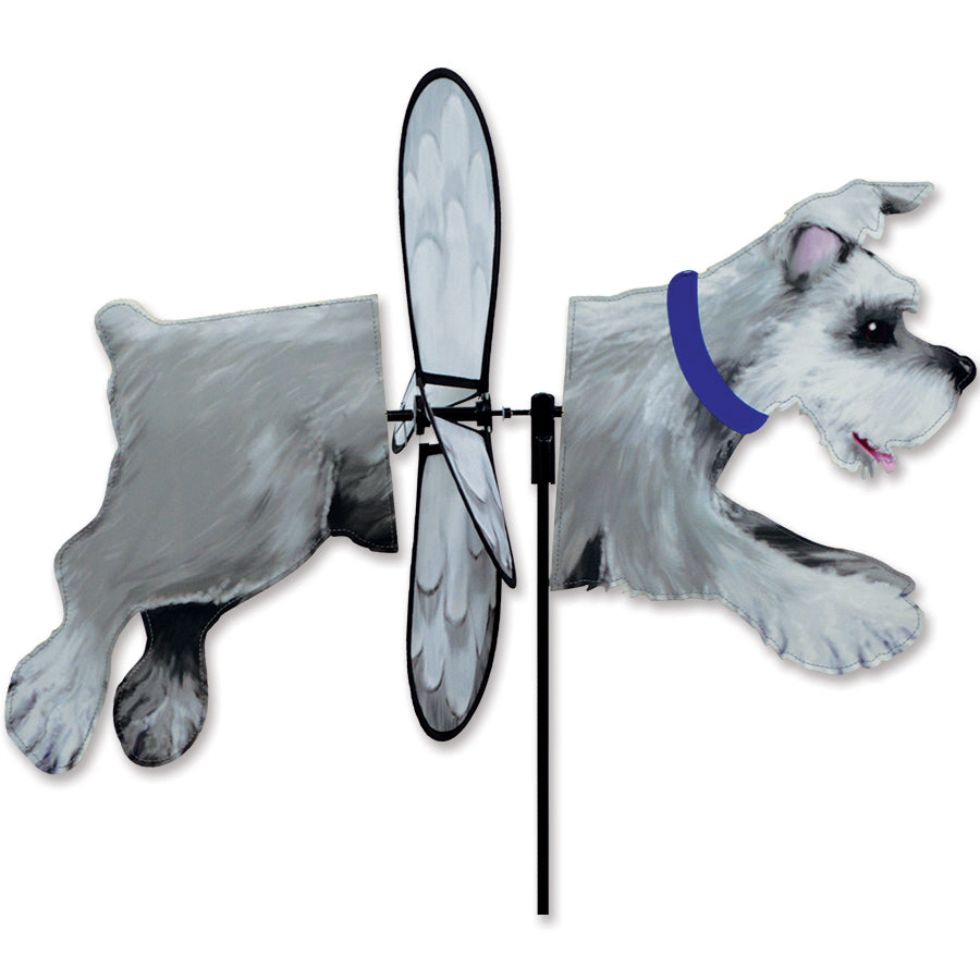 Deluxe Petite Spinner featuring a colorful schnauzer design spinning in a garden, showcasing its vivid colors and playful motion.