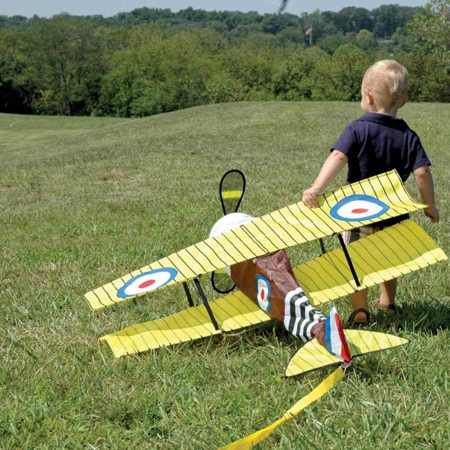 Sopwith Camel biplane kite with WWI-style roundels, spinning propellers, authentic detailing, and easy flight. Line and handle included.