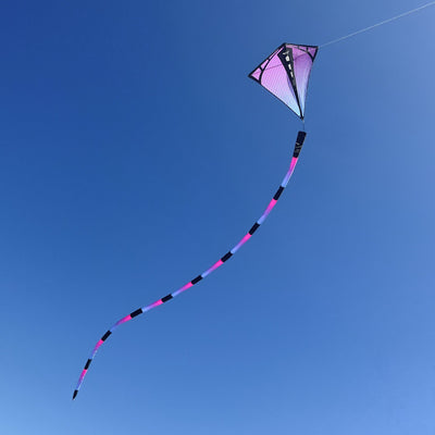 Ultraviolet tube tail with geometric gradient design, inflating airflow construction, and swivel clip for vibrant, motion-filled kite flying.