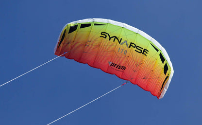 Synapse 170 dual-line stunt kite with frameless fabric sail, 66.5-inch wingspan, and ultra low-stretch Dyneema flying lines in a ready-to-fly package.