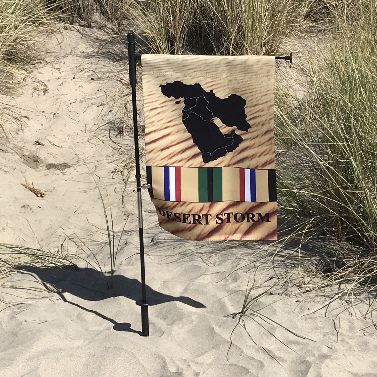 Desert Storm Veteran Lustre Garden Flag displayed outdoors, featuring a vibrant design that honors military veterans with a silky finish, viewable from both sides.