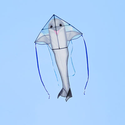 Dolphin 45-inch Fly-Hi Kite flying high in a blue sky, featuring a vibrant dolphin design and colorful streamer tails.