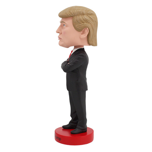 Donald Trump bobblehead over 8 inches tall, featuring an intricate design and hand-painted details, perfect for collectors and supporters.