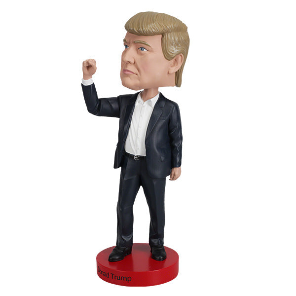 Donald Trump 'Fight!' bobblehead, 7-inch collectible displaying a detailed figure of Trump, showcasing vibrant colors and quality craftsmanship.