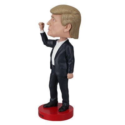 Donald Trump 'Fight!' bobblehead, 7-inch collectible displaying a detailed figure of Trump, showcasing vibrant colors and quality craftsmanship.
