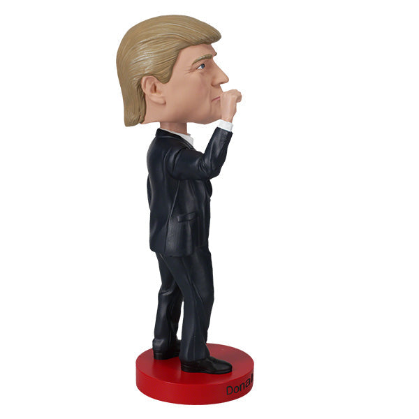Donald Trump 'Fight!' bobblehead, 7-inch collectible displaying a detailed figure of Trump, showcasing vibrant colors and quality craftsmanship.