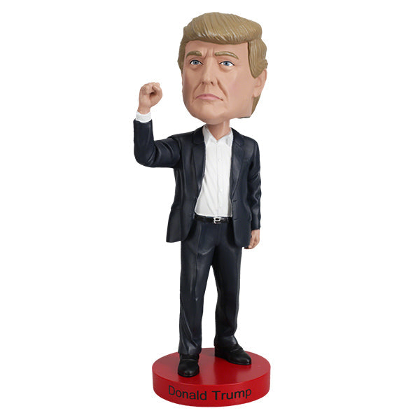 Donald Trump 'Fight!' bobblehead, 7-inch collectible displaying a detailed figure of Trump, showcasing vibrant colors and quality craftsmanship.