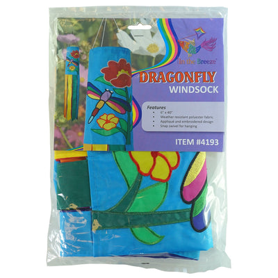 A colorful Dragonfly 40\" Windsock with appliqued graphics and fluttering tails displayed in a garden, showcasing its whimsical design.