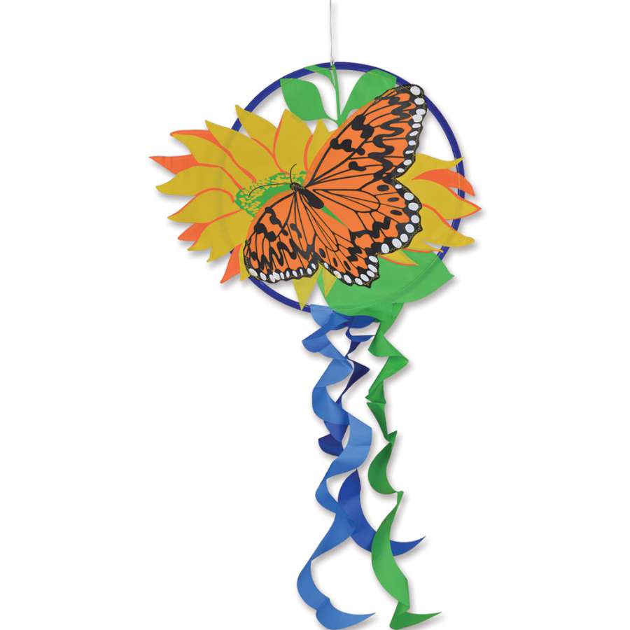 Dreamcatcher - Monarch with vibrant butterfly design, 15-inch hoop, and 18-inch tails hanging gracefully outdoors in a breezy setting.