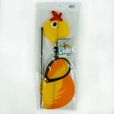 Duck Baby Spinner with bright colors and a 12-inch wheel displaying in a garden, featuring a baby duck design and fiberglass pole.