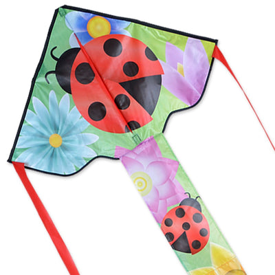 Easy Flyer Kite - Ladybug design soaring against a clear blue sky, measuring 30x90 inches, ideal for family outdoor activities.