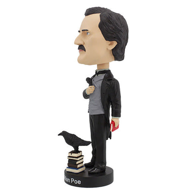 Edgar Allan Poe bobblehead standing 7 inches tall, featuring intricate details and dark attire, displayed on a desk with classic literature in the background.