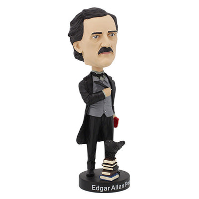 Edgar Allan Poe bobblehead standing 7 inches tall, featuring intricate details and dark attire, displayed on a desk with classic literature in the background.