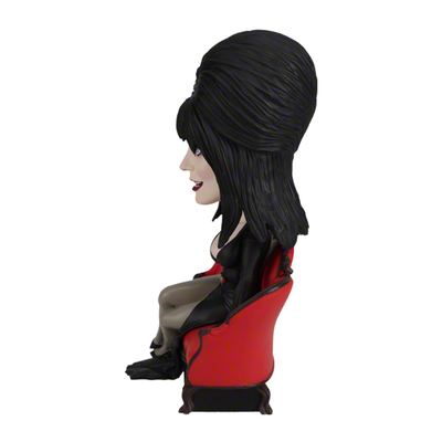 Elvira Lounge Bobblehead featuring the Mistress of the Dark in her signature black gown, set on a decorative display stand.