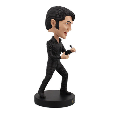 Elvis Presley '68 Comeback Special Bobblehead in black leather outfit, expertly hand-painted, displayed on a shelf against a colorful background.