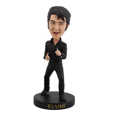 Elvis Presley '68 Comeback Special Bobblehead in black leather outfit, expertly hand-painted, displayed on a shelf against a colorful background.