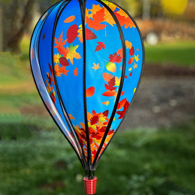 Fall Leaves 10-Panel Hot Air Balloon Spinner featuring colorful autumn leaves in motion, perfect for outdoor decoration and seasonal festivities, hanging from a garden hook.