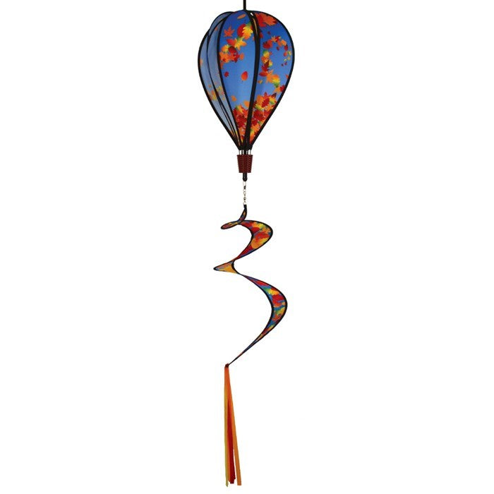 Colorful 6-panel hot air balloon spinner featuring falling autumn leaves, suspended in an outdoor garden setting, capturing the essence of fall.