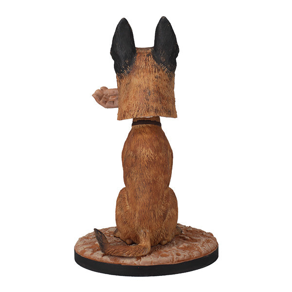 Fallout: CX404 Bobblehead depicting a Belgian Malinois with a severed hand in its mouth, set on a rugged Wasteland base.