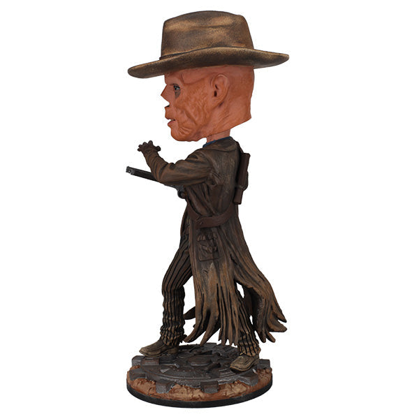 Fallout: The Ghoul Bobblehead showcasing intricate details of a skeletal figure in a cowboy hat and trench coat, standing proudly on a display base.