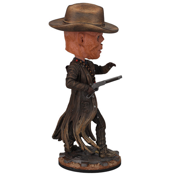 Fallout: The Ghoul Bobblehead showcasing intricate details of a skeletal figure in a cowboy hat and trench coat, standing proudly on a display base.