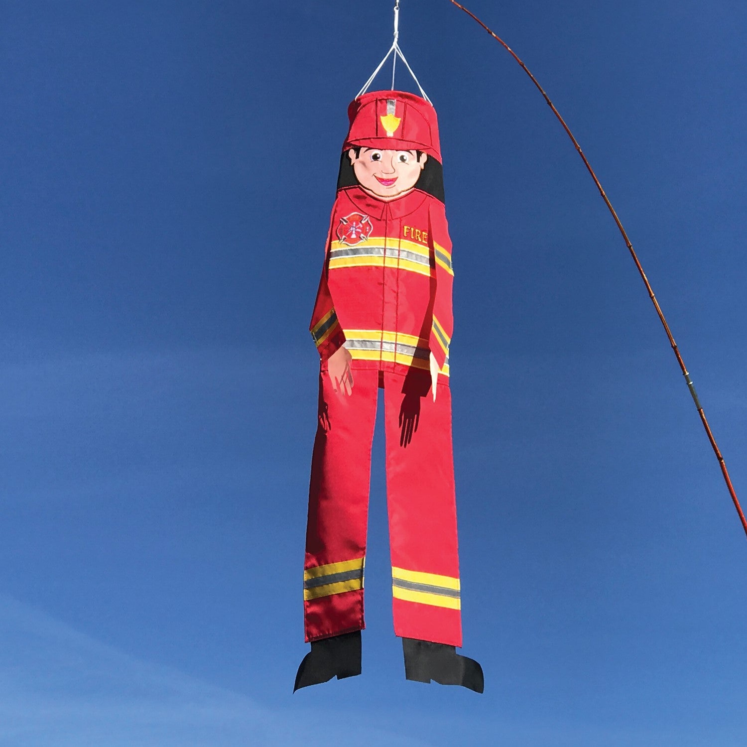 Firefighter 40-inch Breeze Buddy windsock with colorful design and flowing limbs, displayed in a garden setting, showcasing firefighter pride.