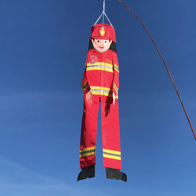 Firefighter 40-inch Breeze Buddy windsock with colorful design and flowing limbs, displayed in a garden setting, showcasing firefighter pride.