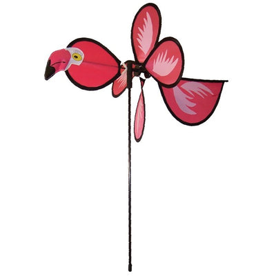 Colorful Flamingo Baby Spinner twirling on a fiberglass pole in a sunny garden, bringing joy and whimsical fun to the outdoor space.