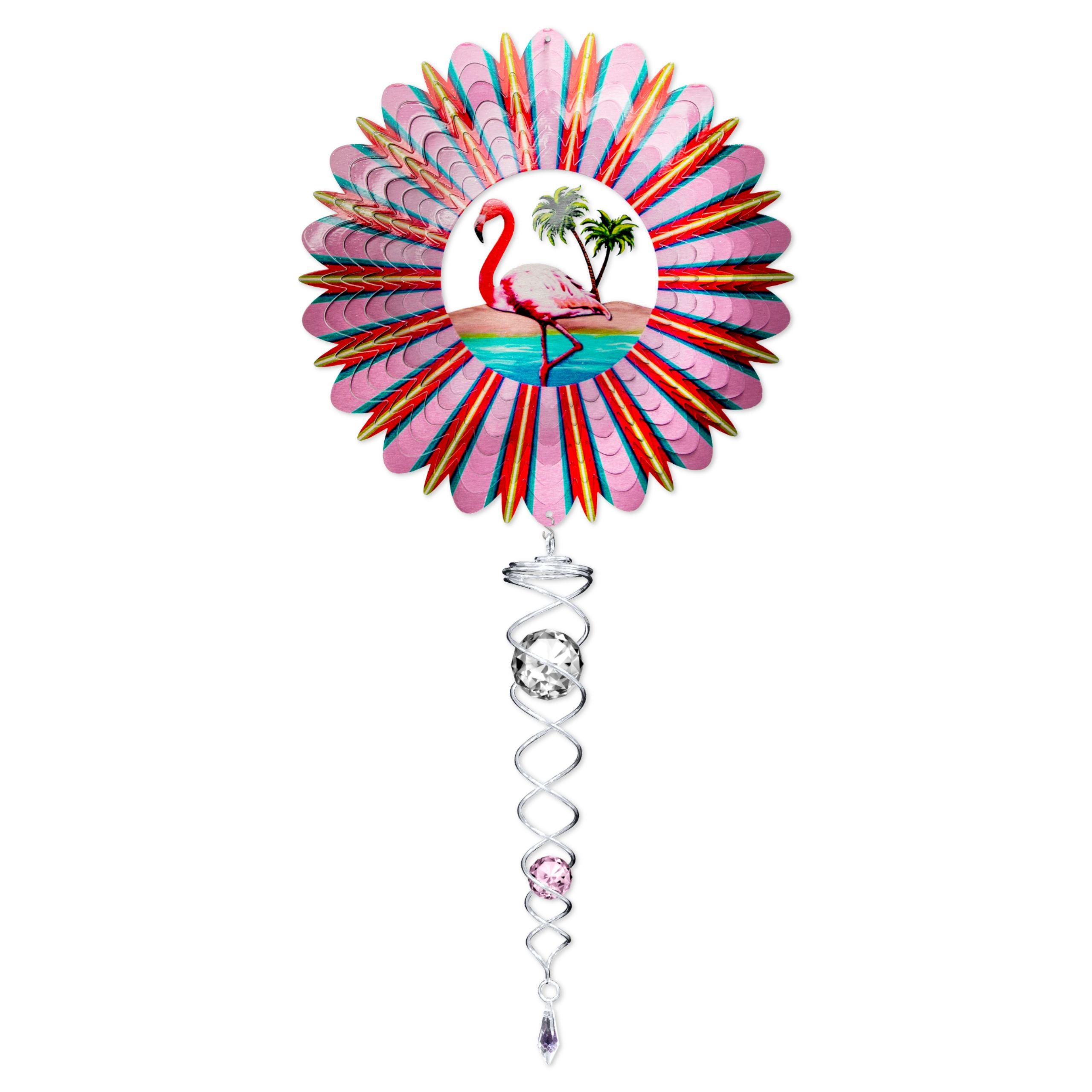 Flamingo Mini Set Wind Spinners showcasing vibrant colors and movement, displayed in an outdoor garden setting under sunlight.