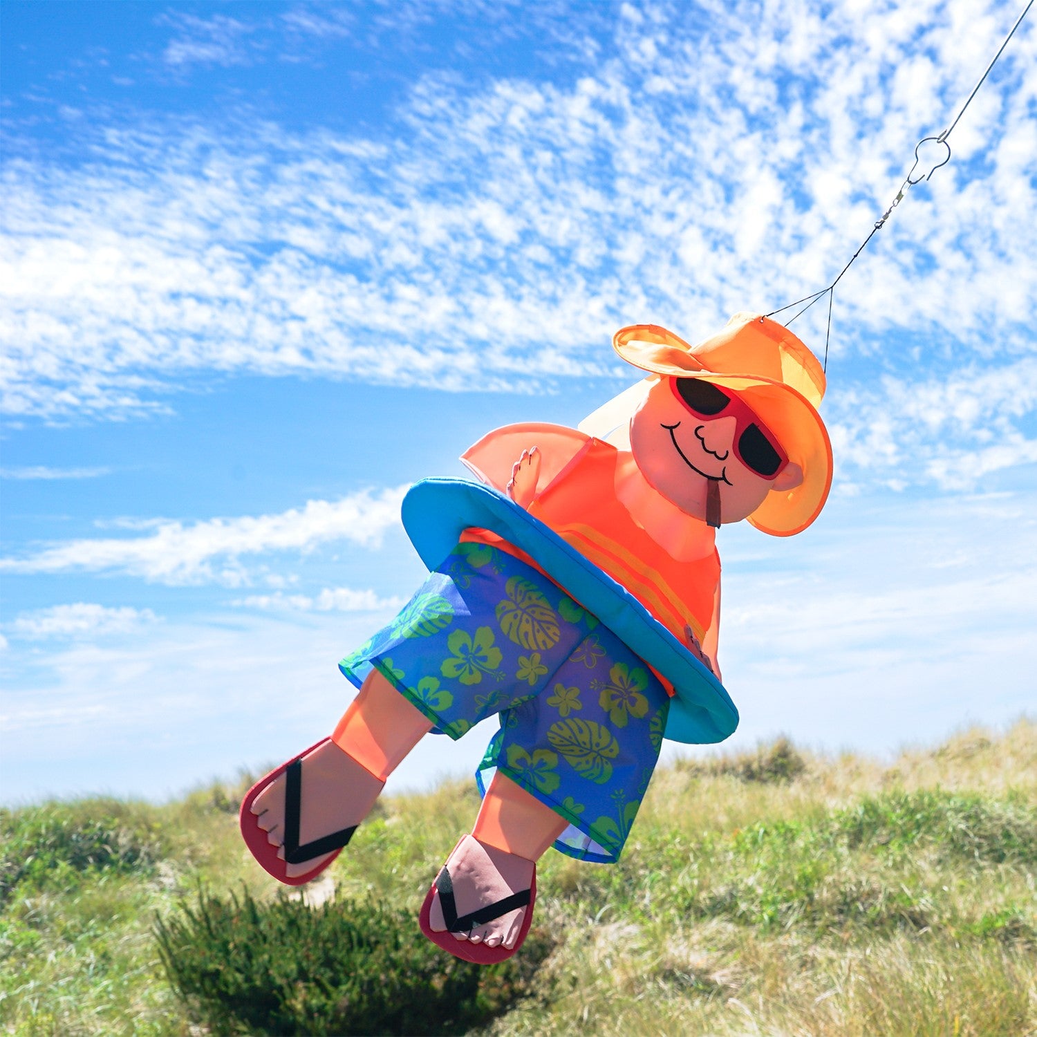 Charming Float Man With Cigar Wind Friend hanging from a tree, featuring a 3D design in vibrant colors and durable fabric, swaying in the breeze.