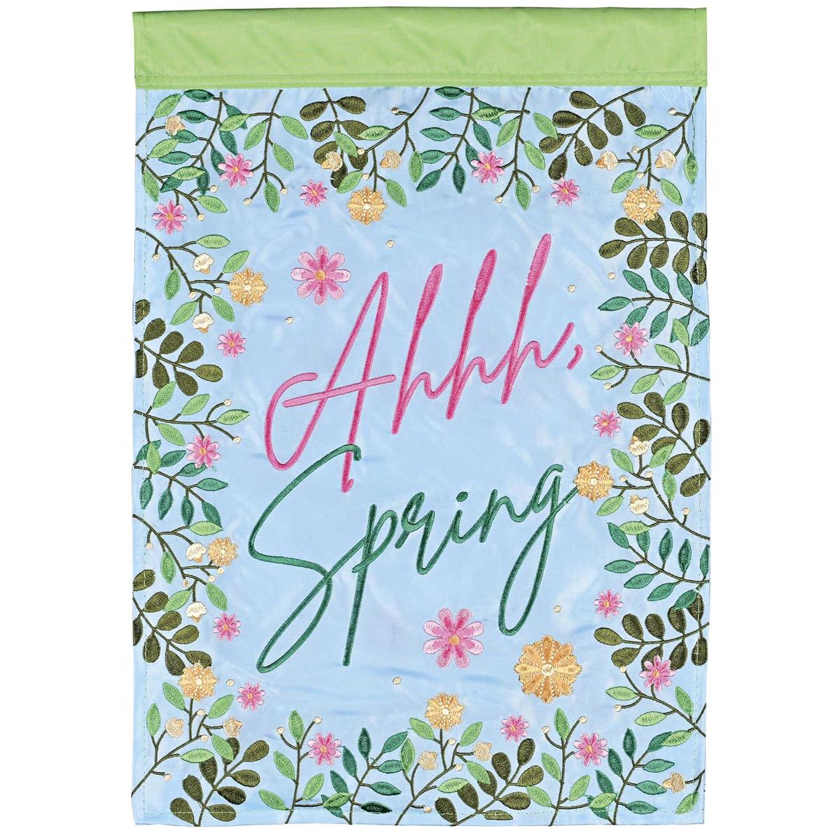 Floral Ahhh Spring Garden Flag featuring vibrant flowers displayed on an outdoor flagpole in a beautifully landscaped garden.