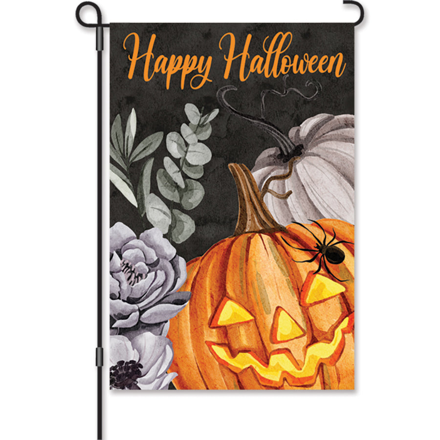 12 in. Floral Jack O'Lantern garden flag with happy pumpkin design, displayed on a decorative flag stand in an autumn outdoor setting.