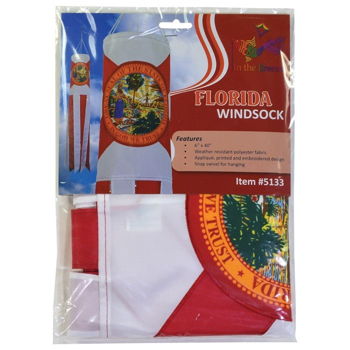 Florida 40-inch windsock displaying the state flag design with bright colors and iconic seal, fluttering outdoors in a scenic garden.