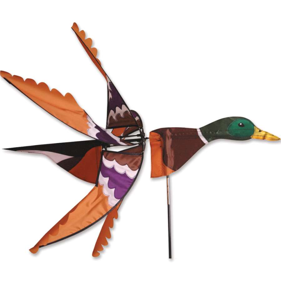 Flying Mallard Spinner garden ornament in motion, showcasing a detailed mallard duck design, rotated by the wind in a vibrant outdoor setting.