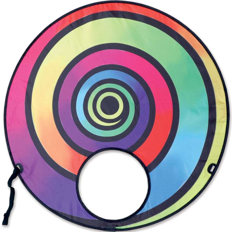 Forehead Flyer kite with vivid colors shown being worn on a person's head outdoors, illustrating fun and playful outdoor activity.