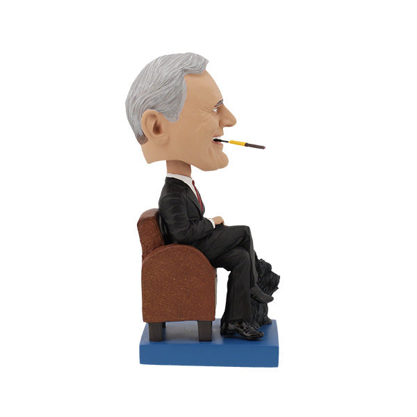 Franklin Delano Roosevelt Bobblehead standing on a shelf, capturing FDR's likeness with a hand-painted finish in a colorful collector's box.