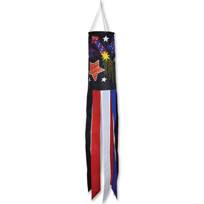 Freedom Fireworks windsock featuring colorful embroidered fireworks pattern, displayed hanging outdoors in a garden setting.