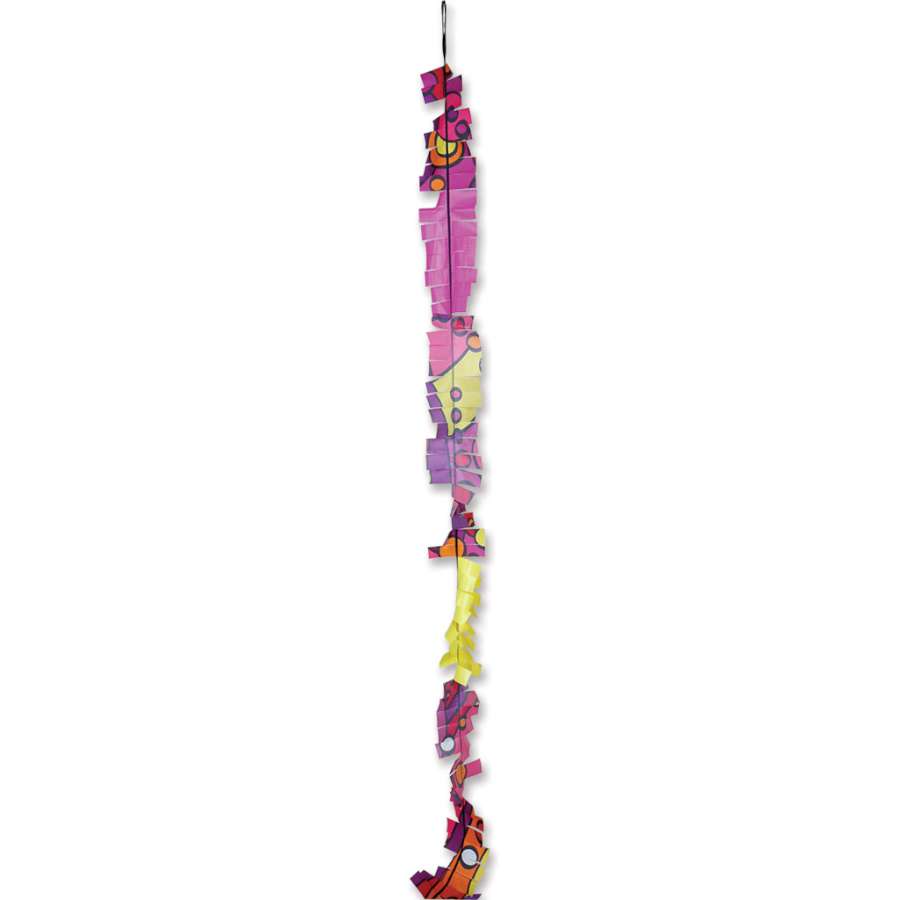 6 in. x 24 ft. Fuzzi Tail - Warm Orbit with vibrant colors flowing gracefully behind a kite in a clear blue sky.