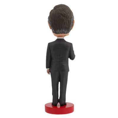 George H.W. Bush Bobblehead standing 8 inches tall with intricate details, hand-painted, and presented in a collector's box.