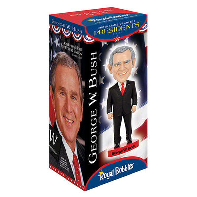 Detailed George W. Bush bobblehead with realistic facial features and vibrant colors, set on a display shelf against a neutral background.
