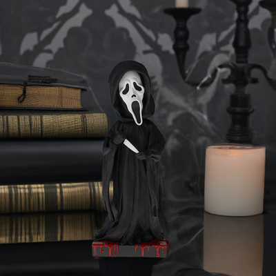 Ghost Face Bobblehead, an 8-inch hand-painted collectible made from polyresin, featuring the iconic mask and robe from the Scream movies.