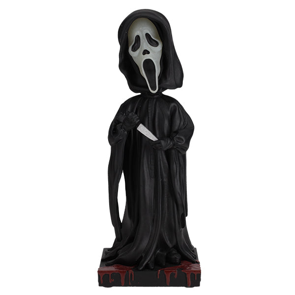 Ghost Face Glow in the Dark Bobblehead featuring the iconic masked character in a detailed design, glowing in a dark setting.