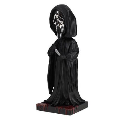 Ghost Face Silver Chrome Mask Bobblehead stands 8 inches tall with a glossy silver finish, showcasing intricate details and features typical of this iconic horror character.