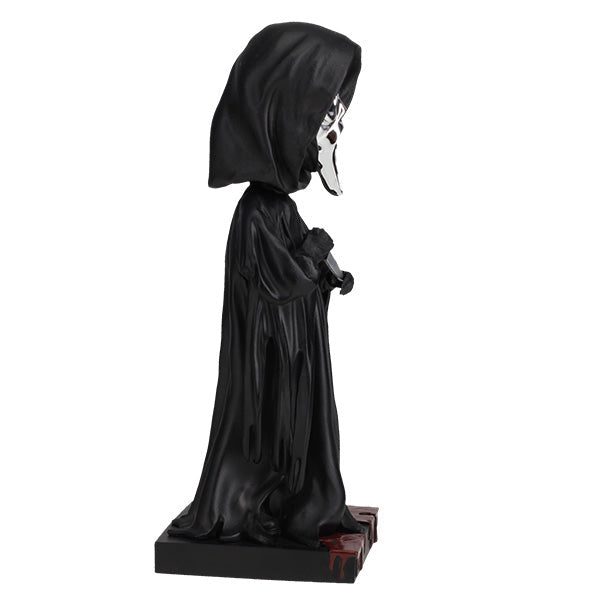 Ghost Face Silver Chrome Mask Bobblehead stands 8 inches tall with a glossy silver finish, showcasing intricate details and features typical of this iconic horror character.