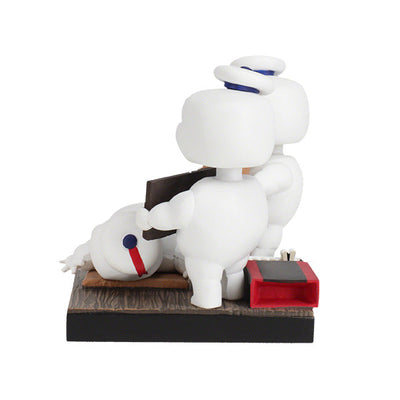Ghostbusters Afterlife Mini-Pufts S'mores Bobblehead, featuring three adorable Mini-Pufts in dynamic poses holding s'mores, standing 4 inches tall.